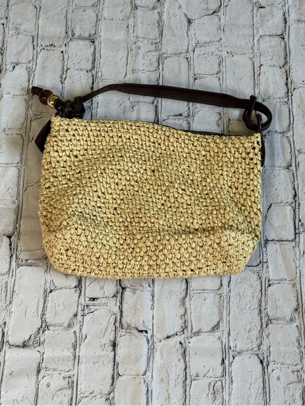 Tan hand bag